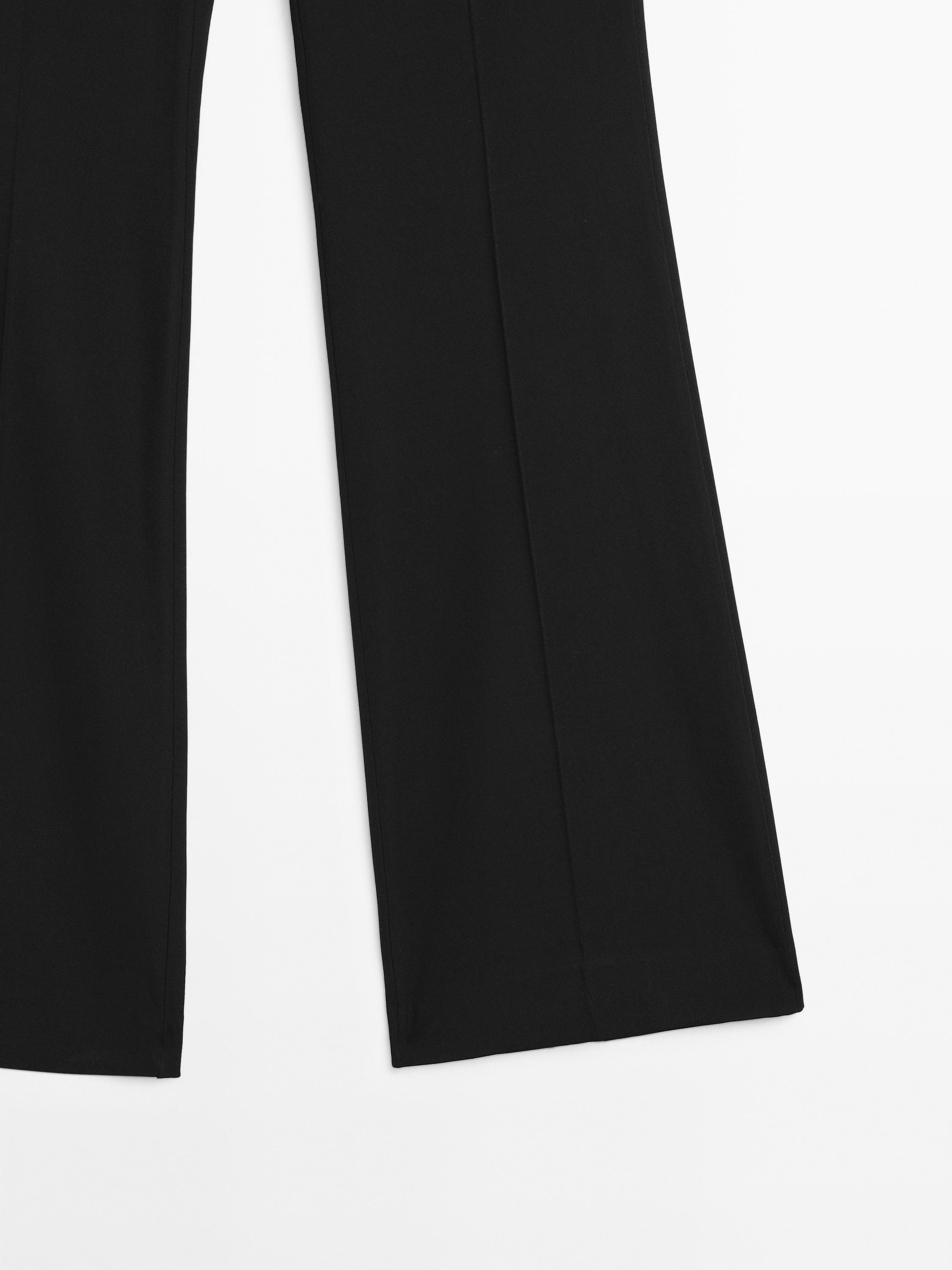 Flared trousers with pocket